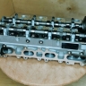 Головка блока цилиндров ГБЦ 4D56U Mitsubishi L200 1005B453, 1005B452
